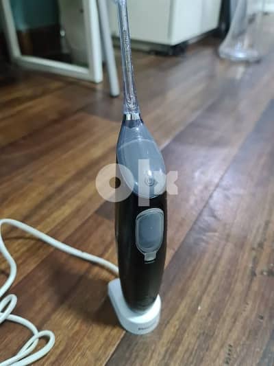 Philips black ultra sonic teeth flosser for sale