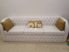 leather pure white sofa - gold cushions