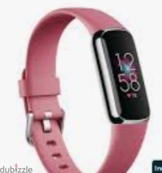 fitbit luxe with charger ,strap ,cartoon 1