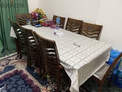 All Wood 8 person dinning table with chairs
