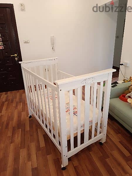 Brand New Crib With Mattress. 28x52 inches & 42 inches in height, 2