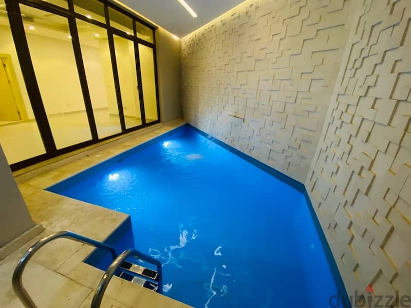 modern four bedrooms with private pool in abu fatira 5