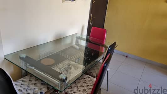 Dining table( Glass) with 6 chairs