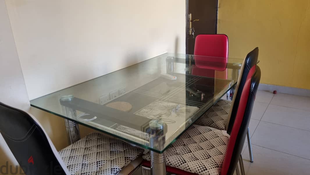 Dining table( Glass) with 6 chairs 1