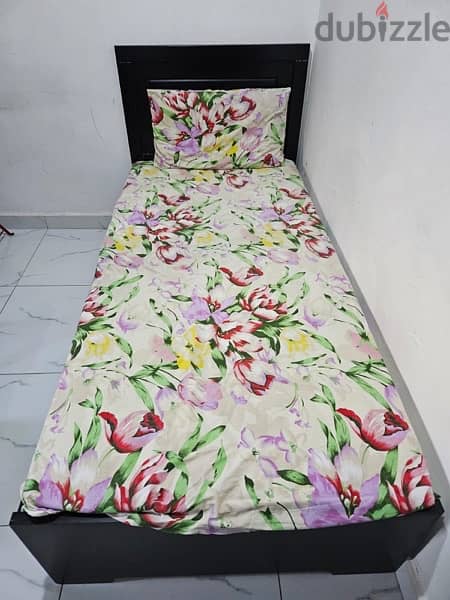 Wooden single bed for sale 0