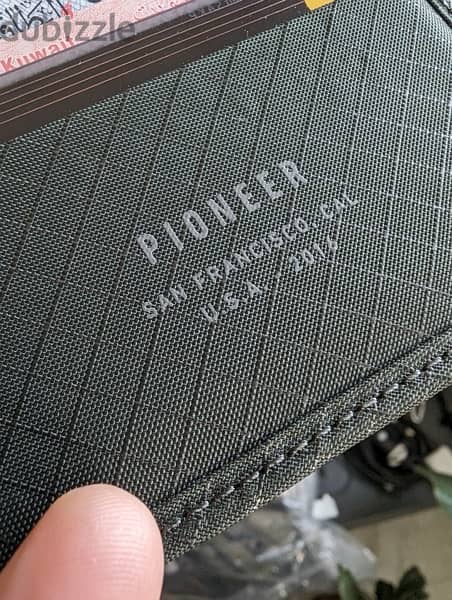 Pioneer made in San Francisco green wallet like new 25 kd 1