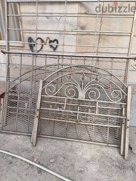 Two iron beds, the large size 190/180 and the medium one 190/120 0