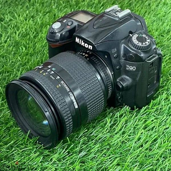 Nikon D90 with lens Speed light flash and studio light 0