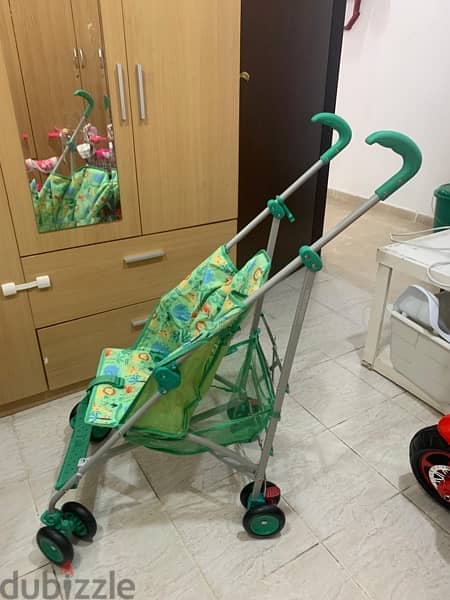 Stroller from Mother care  , can be easily foldable and carry 2
