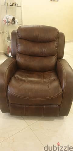 Chaplin Faux Leather Rocking Recliner (HomeCentre)