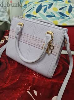Brand new lavender hand bag small purse inside