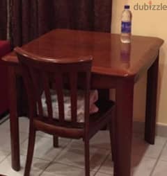 table with 2 wooden chairs. it's square with width 80cm& height 70cm.