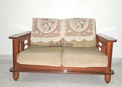 7 seater wooden sofa set including center table for sale.