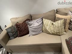 Ikea couch/ sofabed with 9 pillows