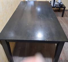 dining table for sale in neat and stable condition with 2 hairs