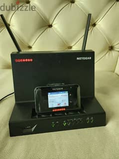 netgear ooredoo cradle and router for sale