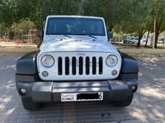Jeep Wrangler sport unlimited 2015 ( perfect condition )