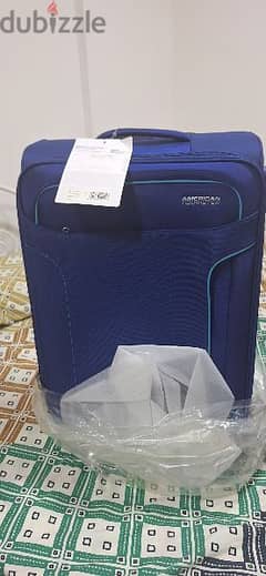 American tourister travelling bag (new) size 68 cm