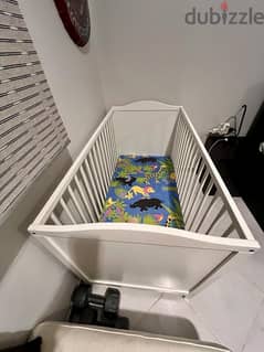 1. Baby crib  (white)   2. Baby walker - both almost new