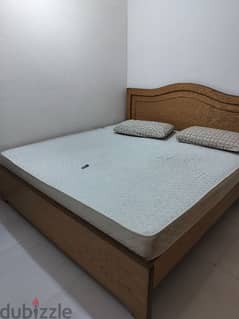 King Size bed with new mattress and pillow