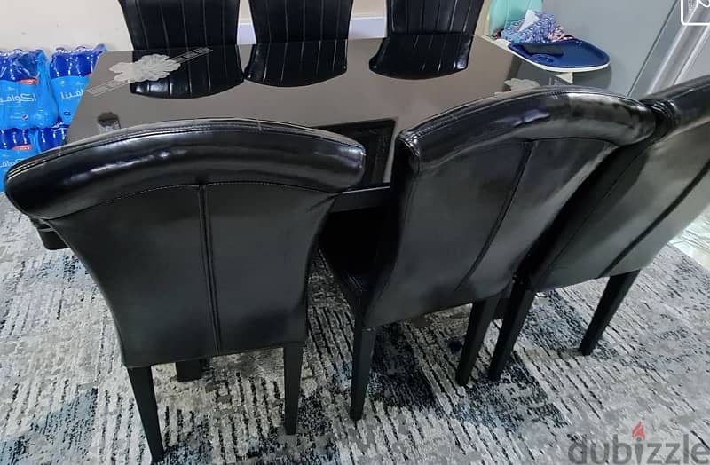 gently used dining table with 6 chairs 1