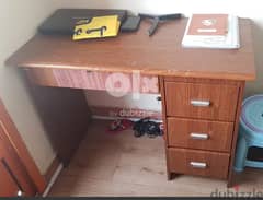 Study table with drawers and a chair