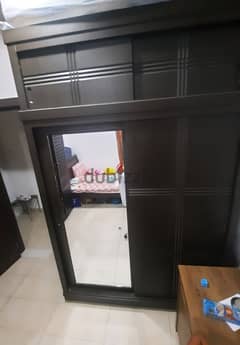Sliding 2 door cupboard for 40kd - strong and in good condition