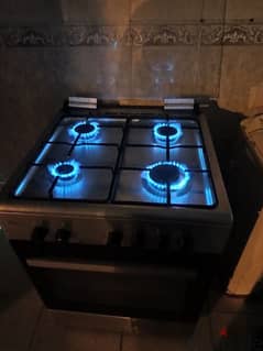 4 burner stove and oven above and below works well