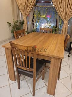 wooden table with 4 chairs
