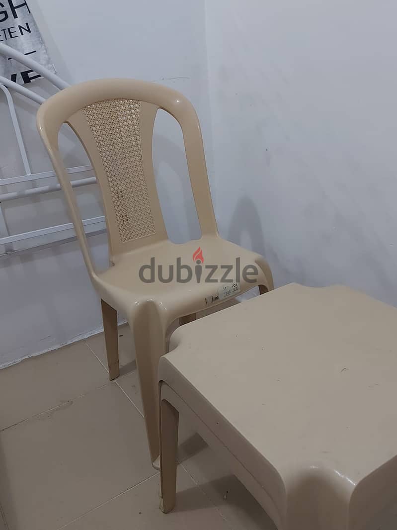 Two plastic chairs and one teapoy for sale in mangaf block 4 2