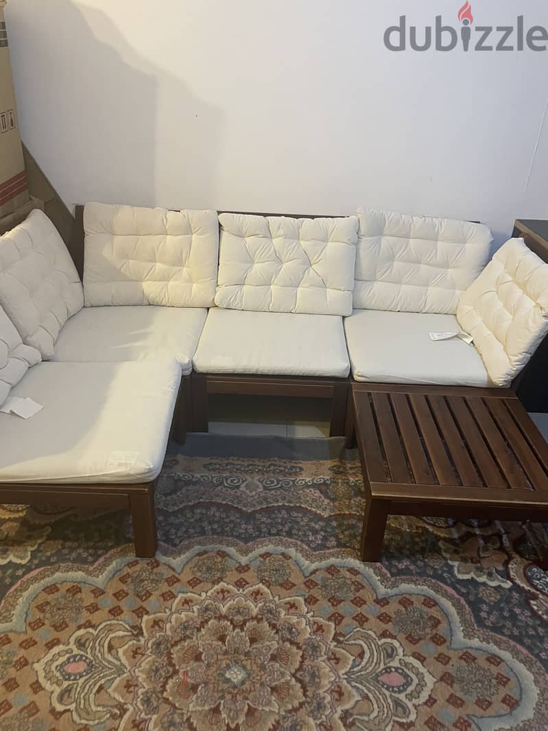 Wooden sofa with cushion Ikea product 1
