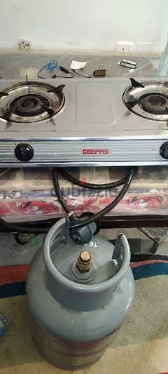 good condition  all in one. gas. stove regulatr