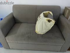 2 seater sofa with cushions