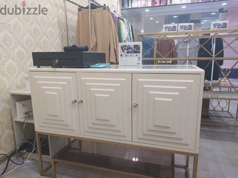 Beautiful tables for cloth or food store with cash till and camera 1