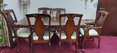 wooden dining table with 6 chairs