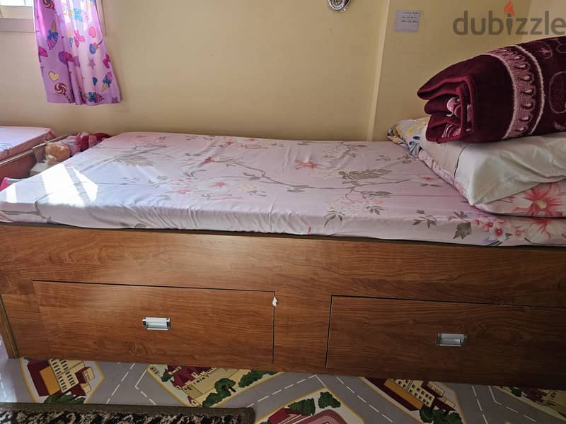 2 Wooden Single Beds with Spacious Drawers and Neat Mattresses 1