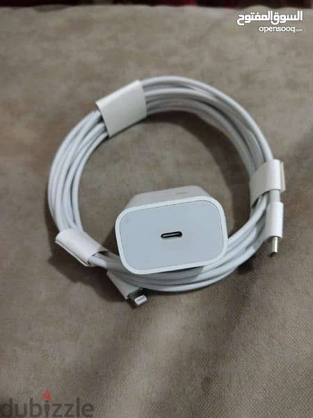 ر New original Apple 20W Pro Max American charger with serial number 7