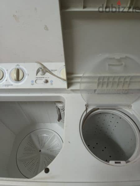 Daewoo 8-kg washing machine, half tub and dryer work well 1
