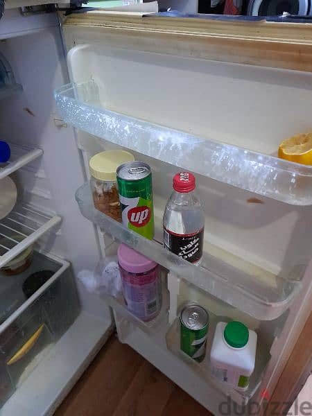 fridge for sale good condition 15kd last if anyone need call me 1