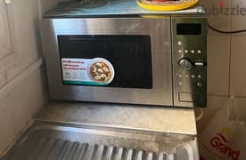 Daewoo Convection oven and Philips vacuum cleaner