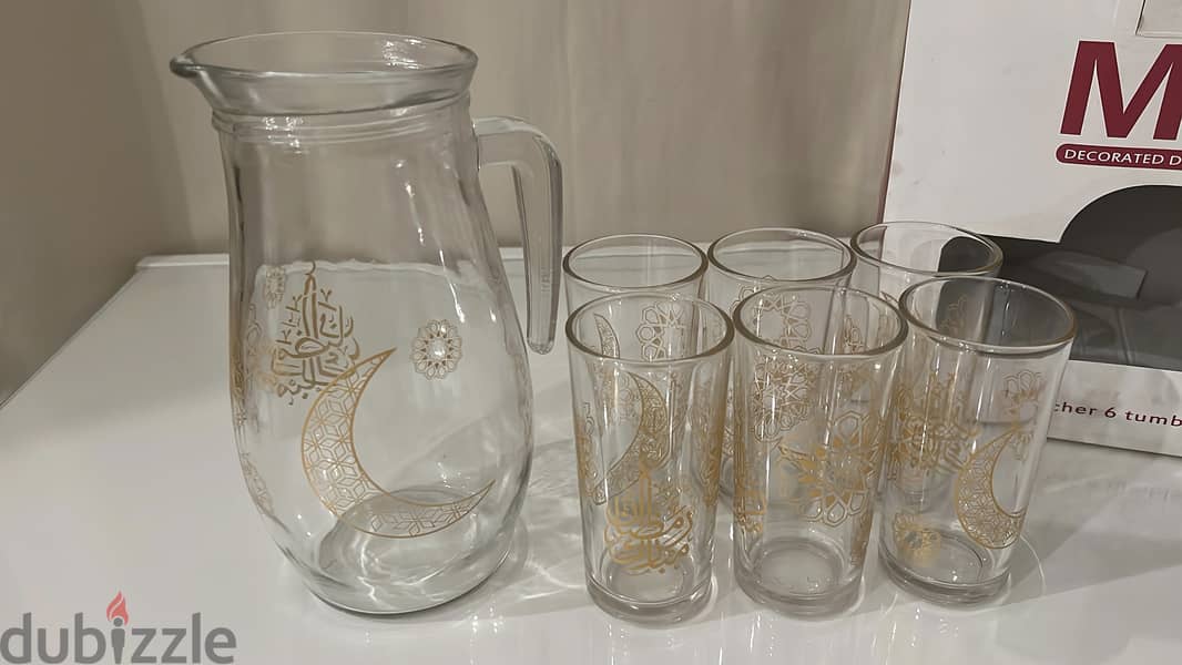 1 picher and 6 tumblers 2
