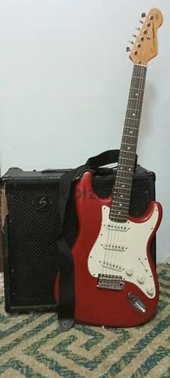 Guitar amplifier and electric guitar