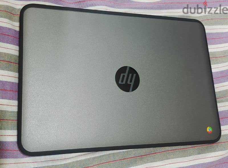 Neat and clean Hp chrome book  & charger 1