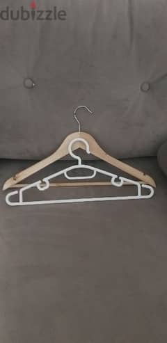 50 wooden and plastic hangers