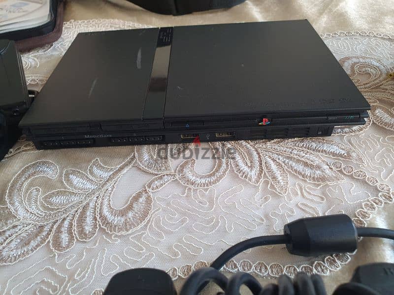 PS2 Console with games 1