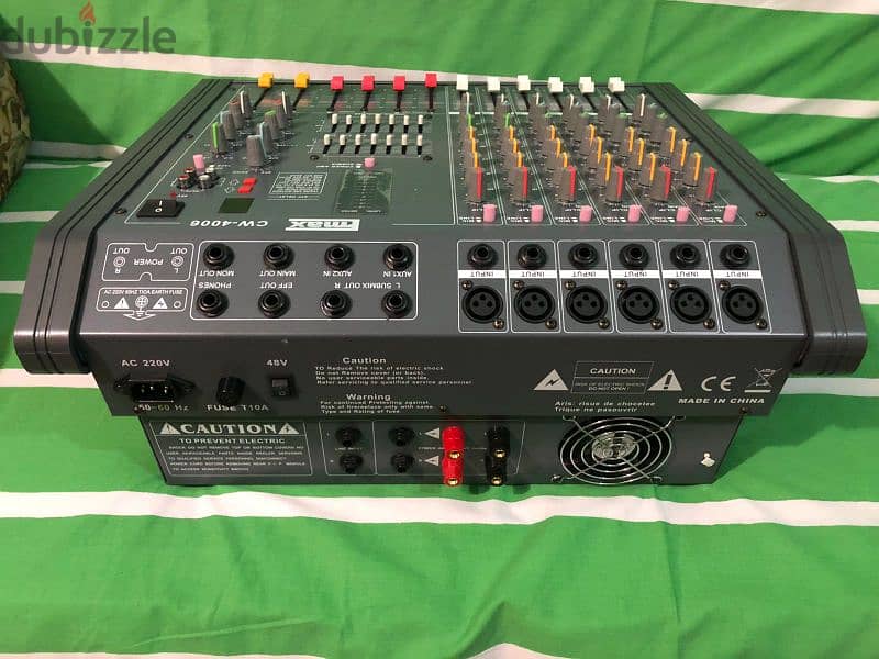 brannew pawerd mixer max 6 channel 400 watts 8 oms. vocal effect . 5