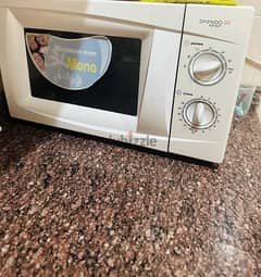 4 years used Microwave oven