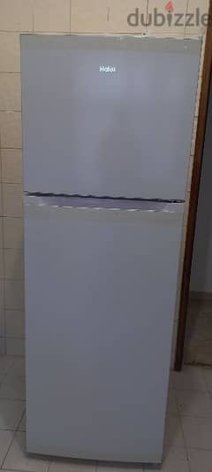 washing machine 8kg and a medium-sized fridge