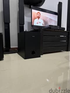 Tv, Home theater Receiver and TV stand