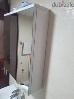 Toilet cabinet with mirror